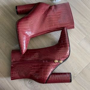 These Three red boots